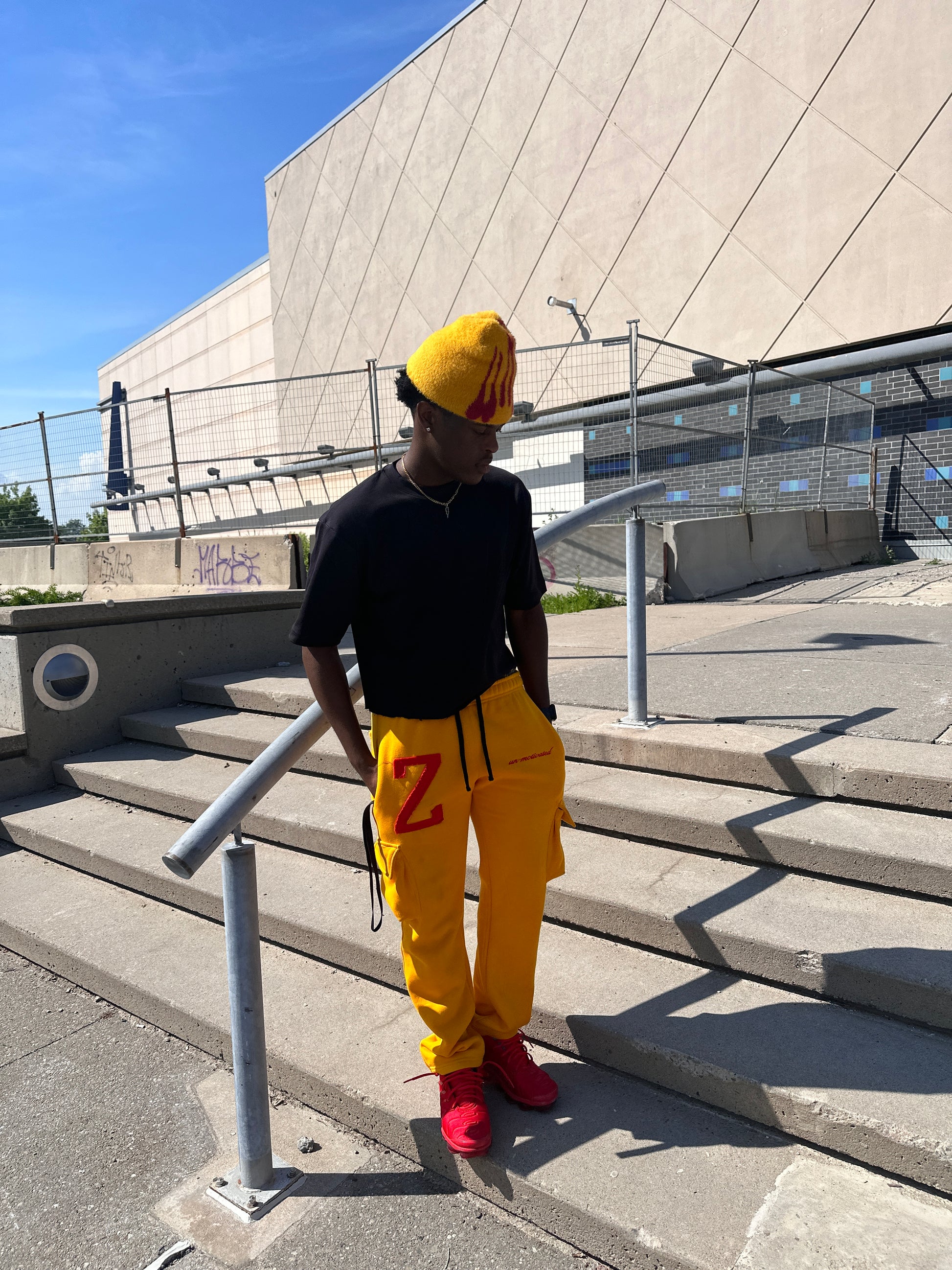 Model is wearing our “VICTORY” cargo pants in the mustard colorway